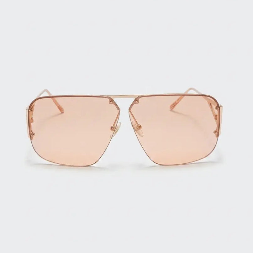 Aviator sunglasses with rose gold lenses and frame on a white background