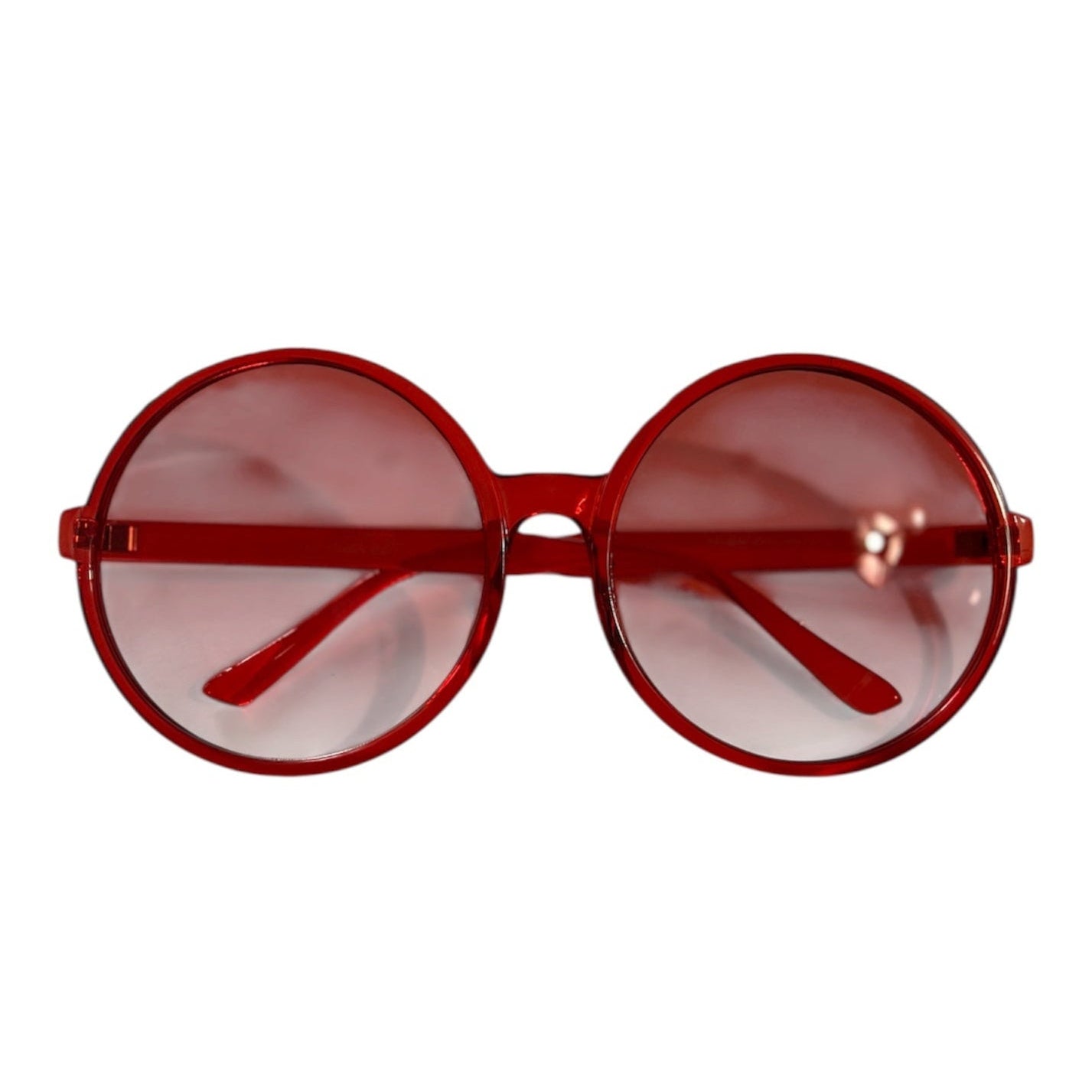 Round red sunglasses with matching red-tinted lenses and a glossy finish, shown on a white background.