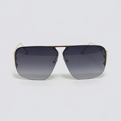 Sunglasses with gradient lenses on a light gray background