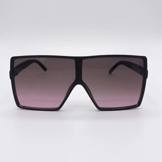 Oversized square sunglasses with a black frame and pink gradient lenses displayed on a light gray background.