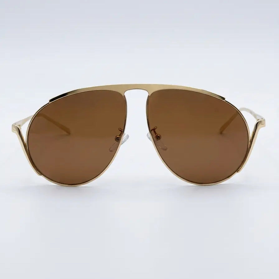 Gold-framed sunglasses with brown lenses on a white background