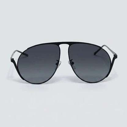 Black sunglasses with gradient lenses on a light gray background