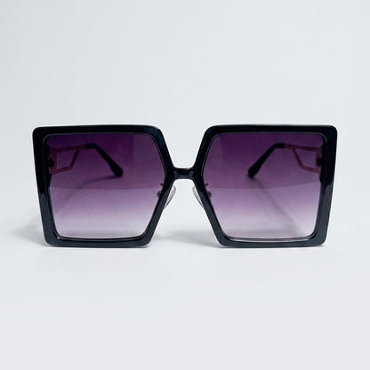 Black sunglasses with purple gradient lenses on a white background