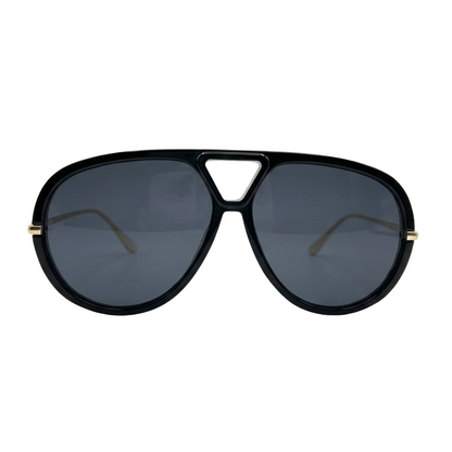 Black aviator sunglasses with gold accents on a white background